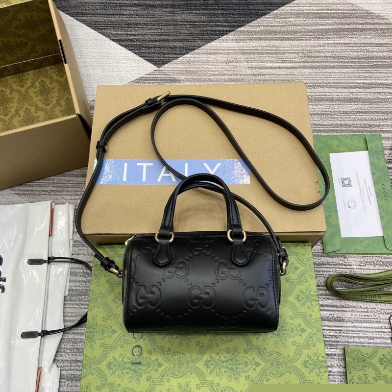 G*u*i top handle bags